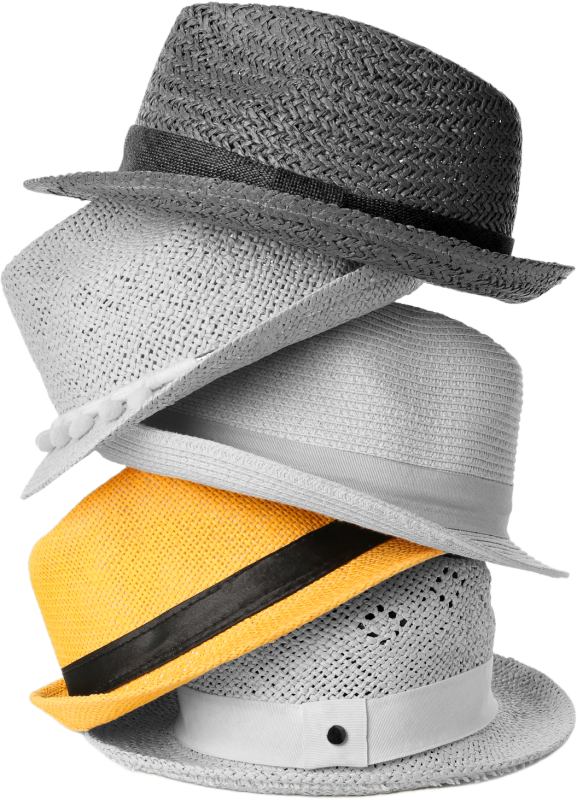 stack of grayscale hats with one yellow one